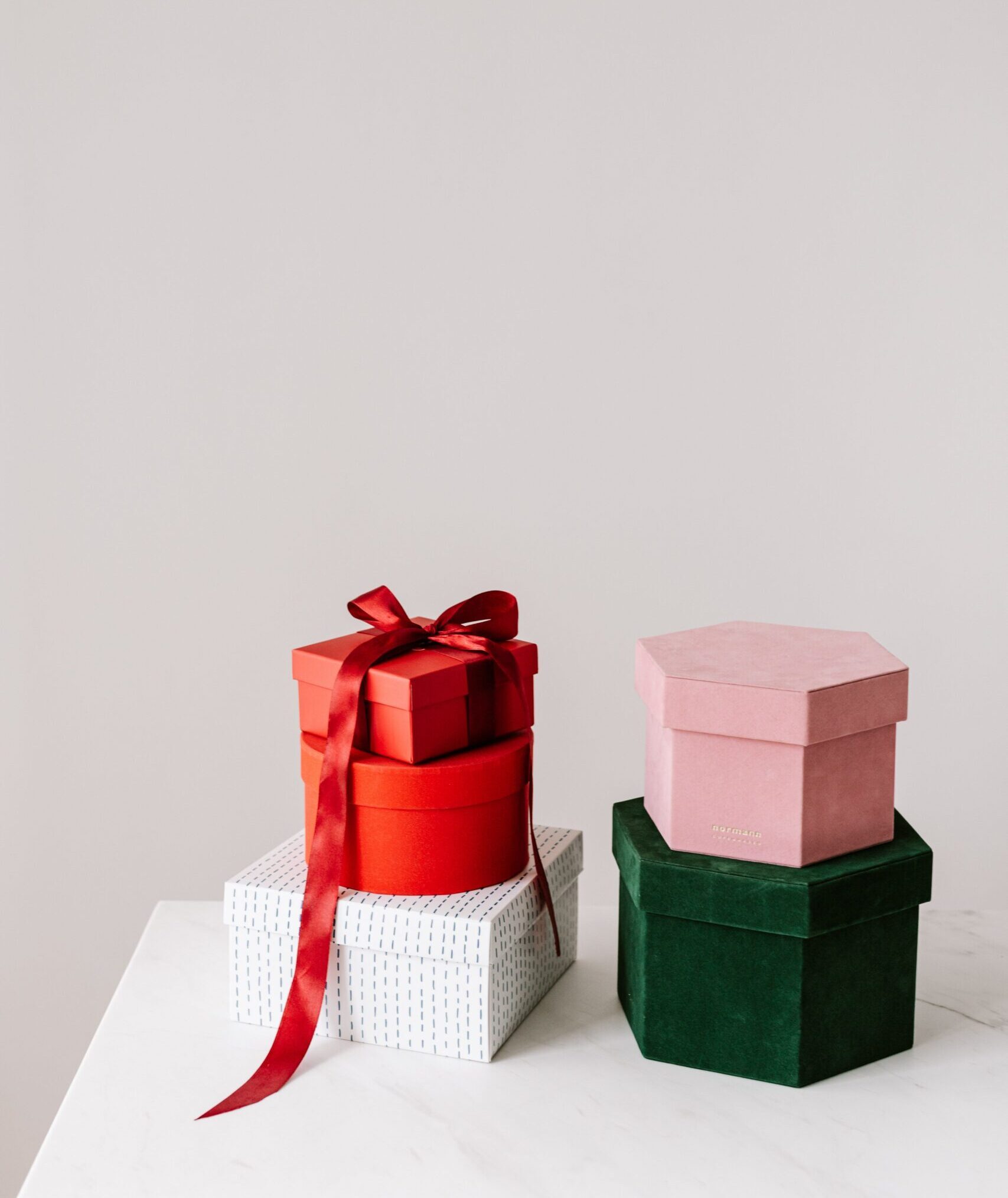 Colorful gift boxes, representing customer referral rewards.