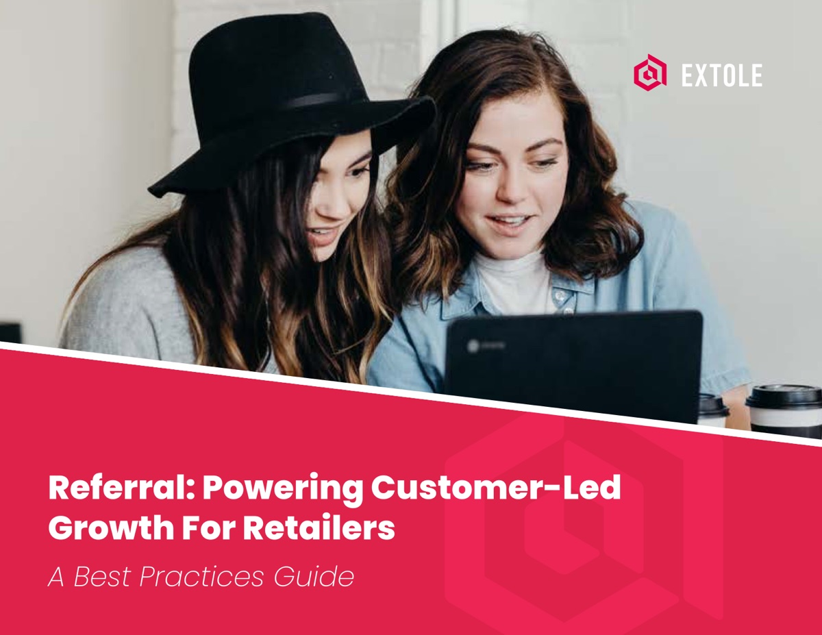 Two shoppers looking at a laptop on the cover of Extole's referral best practices guide for retailers